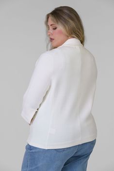 Available in a range of sophisticated colors, this Women's Cotton Blend Shrunken Blazer is a must-have wardrobe staple that complements any style and occasion. Pair it with a crisp blouse and tailored trousers for a professional look, or dress it down with jeans and a simple tee for a chic, casual ensemble. Tailored Tops With Hidden Button Closure For Work, Notch Lapel Tops For Workwear In Fall, Notch Lapel Tops For Fall Workwear, Elegant Notch Lapel Tops For Spring, Elegant Spring Tops With Notch Lapel, Elegant Structured Tops For Workwear, Classic Notch Lapel Tops For Office, Tailored White Tops For Work, White Tailored Tops For Work