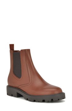 Stretchy gore insets create an easy-on and -off silhouette when you slip into this timeless Chelsea boot with a lug sole for comfort. 1 1/2" heel 5" shaft Leather upper/synthetic lining and sole Imported Lug Sole Booties, Chelsea Boot Women, Perfect Wardrobe, Chelsea Boot, Shoes Booties, Lug Sole, Brown Boots, Natural Leather, Low Heels