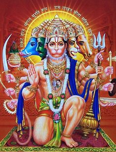 the hindu god is sitting on his knees and holding an item in one hand with two hands