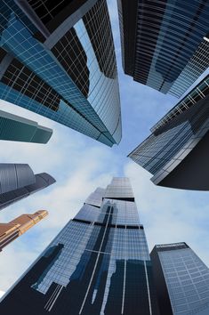 looking up at tall skyscrapers in the city