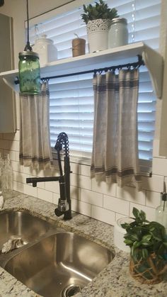 Kitchen windowIkea dish towel curtainspainted mason jarswindow shelf Towel Curtains, Kitchen Window Shelves, Small Farmhouse Kitchen, Simple Home Decoration, Window Shelves, Small Kitchen Decor, Kitchen Farmhouse, Garden Fountains, Kitchen Redo