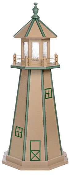 a small light house with green trim around the top and windows on it's sides