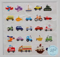 a cross stitch pattern with cars, trucks and planes on white paper in a frame