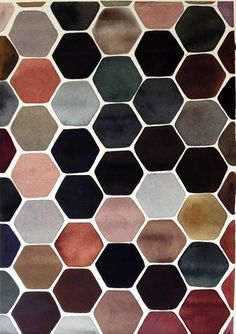 an abstract pattern made up of hexagonals in various colors and sizes, including brown