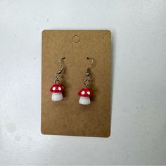 Mushroom Red Handmade Earrings Stainless Steel Hooks! White Mushroom Design Drop Earrings, White Mushroom Design Earrings For Gift, White Mushroom Design Earrings As Gift, White Earrings With Mushroom Design As Gift, Whimsical Adjustable White Earrings, Red Mushroom Design Earrings Gift, White Mushroom-shaped Jewelry With Mushroom Design, White Dangle Earrings With Mushroom Design, Cute White Earrings With Mushroom Design