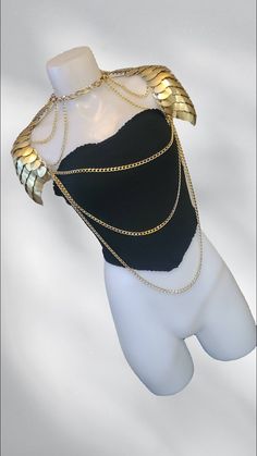 This bold gold scalemail armor and chainmail body chain shoulder armor spaulders set is perfect for any snake, fairy, mermaid, or dragon cosplay or viking costume, or for Renaissance Fair,  outfits, weddings, or music festivals or concert outfits. With adjustable neck and back straps, you'll be ready to conquer whatever adventure you choose. THIS IS NO ORDINARY SCALEMAIL TOP! IT IS PREMIUM CHAINMAIL CRAFTED BY A SKILLED ARTISAN IN CANADA! Fashioned from top-grade stainless steel rings and chains Womens Armor, Fairytale Costume, Armor Fantasy, Costume Viking, Dragon Fairy, Gold Armor, Fairy Tale Costumes, Fairy Cosplay, Scale Mail