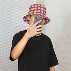 Elevate your festival and outdoor experience with our Reversible Trendy Bucket Hat - the ultimate accessory for those sunny, music-filled days! Perfect for festivals, concerts, raves, and all your outdoor adventures, this hat blends style and functionality effortlessly. Its on-trend design ensures you stand out in the crowd, while the wide brim provides shade and protection from the sun. Lightweight and comfortable, it's an ideal companion for dancing, exploring, or simply soaking up the vibrant atmosphere. Don this hat to make a statement and stay cool in warm weather - because fashion should never compromise on fun! Comes in Three different sizes, X-small,  Small/Medium and Large/XLarge Shipping: Because this is a custom made to order product fufillment/shipping 10-12 Business Days Bucket Hat Designs, Mens Rave Outfits, Music Festival Accessories, Rave Hats, Custom Bucket Hats, Vacation Hat, Rave Accessories, Outfits Rave, Reversible Bucket Hat