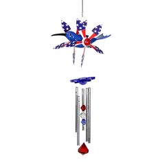 a wind chime with an american flag design and two birds on it's side