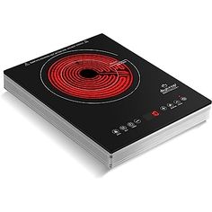 a black and red electric cooktop on a white background