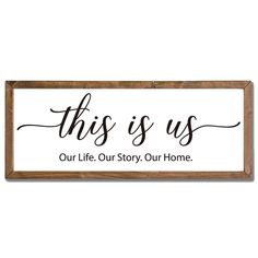 this is us sign with the words our life story, our home in black ink