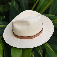 California chic made easy! A timeless look offering understated casual elegance, the Brody is ethically made and one of our best-selling styles.  An excellent choice for anyone looking to build their capsule accessories collection, the Brody promises to effortlessly elevate your style. #fedorahat #strawhat #Panamahat #ethicalhat #sustainablehat Luxury Panama Hat For Spring Vacation, Luxury Spring Vacation Panama Hat, Luxury White Beach Hat, Luxury Summer Beach Fedora, Modern Summer Beach Hats, Modern Beach Hats For Summer, Classic Everyday Fedora For Spring, Classic Straw Hat For Vacation, Classic White Panama Hat For Travel