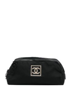 black signature interlocking CC logo logo patch to the front jacquard logo motif top zip fastening two main compartments Serial Number: 7832885 This item comes with an original authenticity seal. This item comes with an original Chanel authenticity card. Purchasing this item continues its narrative and reduces the environmental impact by avoiding the use of new resources needed to make the product from scratch, such as water, materials and electricity, and avoiding additional manufacturing impac Chanel Cosmetic Bag, Shopping Chanel, Chanel 2, Boot Pumps, Cosmetic Pouch, Cc Logo, Pump Sandals, Lady Dior, From Scratch