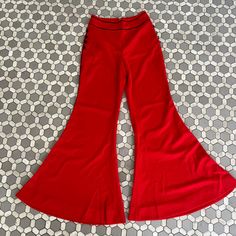 Vintage 70s Frederick's of Hollywood red flare pants. Polyester, black piping along the side, zipper in back.  Waist 26 rise 11 hip 36 Inseam 28 70s 60s 1960s groovy floral hippie psychedelic colorful bright fun pop art Red Flare Pants, 60s Hippie, Red Flare, Fredericks Of Hollywood, Novelty Print, Vintage 1970s, Flare Pants, Bell Bottoms, Vintage 70s