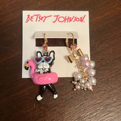 Authentic Betsey Johnson Playful Mismatched Earrings Featuring French Bulldog In A Pink Flamingo Pool Float And An Ombre Pearl Cluster With A Bow. Earrings Have A Lever Back Closure. Made From Polished Gold-Tone Metal, Plastic And Faux Pearls. Polished Gold-Tone Metal With Plastic Lever Back Closure 2" Length 0.6"-1" Width Pink Flamingo Pool, Flamingo Pool Float, Mismatch Earrings, Dog Pearls, Flamingo Color, Flamingo Pool, Mismatched Earrings, Pearl Cluster, Betsey Johnson Jewelry