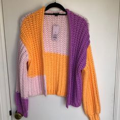 Never Worn, Smoke Free Pet Free Home. Wide Sleeve Cardigan, Oversized Orange Winter Cardigan, Oversized Orange Cardigan, Multicolor Knit V-neck Sweater Vest, Cozy Multicolor V-neck Sweater, Cheap Orange V-neck Cardigan, Orange Cardigan, Multicolor Sweater, Open Sweater