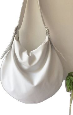 White Hobo Bag With Detachable Strap For Evening, Elegant White Hobo Bag With Detachable Strap, Elegant Evening Hobo Bag With Large Capacity, Elegant Large Capacity Hobo Bag For Evening, Elegant White Evening Hobo Bag, Elegant Crossbody Hobo Bag, Formal White Hobo Bag With Detachable Strap, White Formal Hobo Bag With Detachable Strap, White Large Capacity Shoulder Bag For Formal Occasions