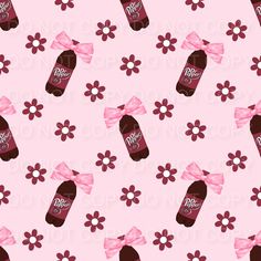 a pink and brown bottle with a bow on it's head is surrounded by flowers