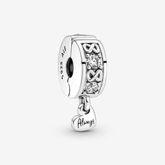 Functional yet stylish, the Family Always Pavé Clip Charm features an alternating infinity symbol and stone pattern on the rim. The polished sterling silver heart dangle is engraved with "Always" to remind us that the love of family is eternal. This clip charm has a silicone grip to prevent sliding and can be styled anywhere on a bracelet except raised charm dividers. Pandora Family, Charms Pandora, Bracelet Pandora, Mors Dag, Stone Pattern, Silver Gifts, Pandora Bracelet, Sterling Silver Heart, Pandora Jewelry