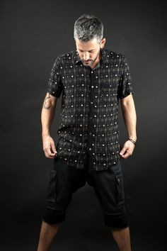 This unique button-down shirt combines both printed and black fabric, has a classic collar neckline and one pocket to the chest with unique designed detail. Made from high quality, soft, comfortable, flexible, and super-light fabric - 100% viscose This design is digitally printed with a unique print in hi-res quality. This is the perfect choice for those festival nights and your afternoon hangout with friends. This t-shirt can be worn day to night, all year round, with an under-shirt or without Black Relaxed Fit Shirt With Buttons, Black Relaxed Fit Shirt With Button Closure, Fitted Short Sleeve Black Shirt With Buttons, Fitted Black Button-up Short Sleeve Shirt, Fitted Black Short Sleeve Button-up Shirt, Black Relaxed Fit Button-up Shirt, Black Relaxed Fit Camp Shirt With Button Closure, Black Button-up Camp Shirt With Button Closure, Black Button-up Camp Shirt