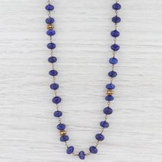 "This lovely new necklace is an authentic Nina Nguyen piece. This necklace has a retail price of $395. Gem: Blue Lapis Lazuli Metal: Sterling Silver, 22k Gold Vermeil Weight: 30.9 Grams Stamps: Nina Nguyen N 925 Style: Bead Chain Closure: Lobster Clasp Length: 38 1/2\" Adjustable Length Width: 7.5 mm - 8 mm Each piece is thoroughly examined and refinished as needed by our professional jewelers, graded by our in-house GIA (Gemological Institute of America) Graduate Gemologist, and inspected for q Traditional Lapis Lazuli Gemstone Beads Necklace, Lapis Lazuli Necklaces With Faceted Beads, Gold Lapis Lazuli Necklace With Faceted Beads, Lapis Lazuli Faceted Bead Necklaces, Blue Faceted Lapis Lazuli Beaded Necklaces, Lapis Lazuli Beads, 22k Gold, Beaded Chain, Lapis Lazuli