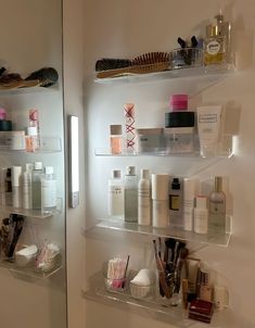 the shelves are filled with cosmetics and personal care items