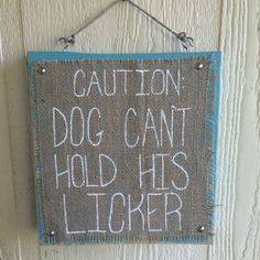 a sign that says caution dog can't hold his licker on the wall