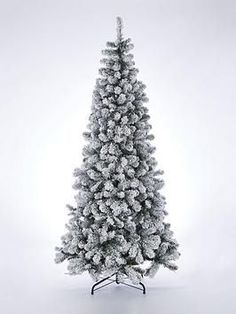 a white christmas tree with snow on it