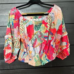 Never Worn Blouse That Is Fantastic For Summer And Vacations. Light Fabric With Beautiful Floral Tropical Pattern. Off The Shoulder And Cropped Fit With Elastics At Neckline And Bottom. Printed Pink Summer Top, Spring Pink Printed Crop Top, Spring Printed Crop Top, Beach Blouse With Tropical Print In Cotton, Summer Pink Blouse For Beach, Pink Summer Blouse For Beach, Summer Pink Tops With Vibrant Print, Summer Vibrant Print Pink Tops, Summer Pink Blouse With Tropical Print