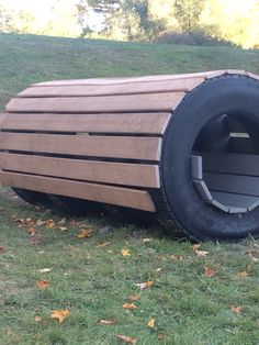 a large tire that is sitting in the grass