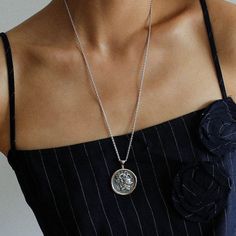 Introducing our "Classic Alexander Silver Coin Plus Necklace" – a timeless and sophisticated piece that combines the allure of a classic coin pendant with an additional layer of elegance, creating a versatile and stylish necklace.Key Features:Classic Coin Pendant: The necklace features a classic Alexander silver coin pendant, evoking a sense of history and timeless charm. The coin design adds a touch of vintage sophistication to the overall aesthetic.Additional Layer: Enhancing the necklace's el Elegant Silver Tarnish Resistant Necklaces, Everyday Luxury Sterling Silver Tarnish-resistant Necklace, Elegant Engraved Medallion Necklace For Formal Occasions, Elegant Round Pendant Coin Necklace, Elegant White Gold Locket Necklaces, Elegant White Gold Necklace With Locket, Sterling Silver Tarnish Resistant Necklaces For Everyday Luxury, Elegant Engraved Gold-plated Coin Necklace, Elegant White Gold Locket Necklace