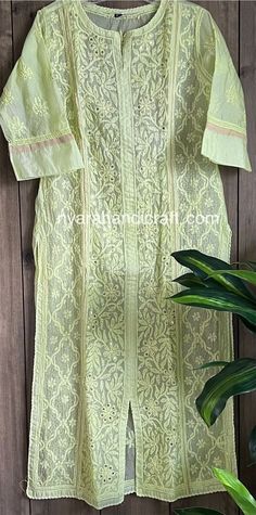 Elegant lime green color kurta on Kota Silk. Chikankari hand embroidery embellished with mukaish work. Kurta Fabric: Kota Silk Kurta Length- 47 inches Green Traditional Wear With Dori Work For Spring, Bollywood Style Pista Green Traditional Wear With Chikankari, Pista Green Kurta With Chikankari Embroidery For Spring, Pista Green Chikankari Embroidery Traditional Wear For Festivals, Pista Green Long Sleeve Traditional Wear With Chikankari Embroidery, Pista Green Traditional Wear With Chikankari Embroidery, Chanderi Salwar Kameez With Cutwork Straight Kurta, Cutwork Mulmul Kurta For Eid, Pista Green Chanderi Traditional Wear With Chikankari Embroidery