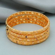 PLEASE CLICK BELOW ON  Learn more about this item  to see  DESCRIPTION Discover the allure of Handmade Gold Jewelry at https://morvijewels.etsy.com/   Get a dazzling 25% off on all our 22k and 18k gold pieces. Don't miss out on this limited-time offer. Shop now and embrace the radiance of gold! Beautiful yellow gold handmade bangle bracelet, vintage design jewelry Metal - real Yellow Gold  Gold Purity- 22 karat yellow Gold Length- 6.1 cm inner diameter all size are available please contact for different size Width - 0.5 cm approx  Weight - 20.46 grams approx (4 pcs ) for 22k. pure handmade work done . for 18k weight would be less. Click here  https://morvijewels.etsy.com/    to get more discount and offers Happy to take wholesale bulk orders. Please Note - We specialize in crafting exquisi Gold Bracelets For Diwali Marriage, Gold Bracelets For Marriage Diwali Celebration, Gold Bangle Jewelry For Diwali, Gold Temple Jewelry Bracelet For Marriage, Gold Bracelets For Marriage Diwali Festival, Gold Plated Bracelets For Diwali, Gold Plated Bracelet For Puja, Gold Plated Jewelry Bracelet For Puja, Gold-plated Bracelets For Diwali