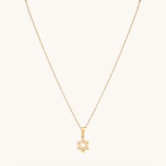 A daily reminder of what you believe in. Simple yet significant, this gold necklace is sure to become a cherished staple in your jewelry rotation. Metal: 18k PVD gold plated over stainless steel Length: 16 inches in length + 2-inch extender (18 inches total) Lightweight Hypoallergenic Waterproof Tarnish-free Waterproof Jewelry, Star Of David, Daily Reminder, Jewelry Plate, Gold Necklace, Gold Plate, Plating, Stainless Steel, Stars