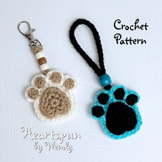 a crochet key chain with a dog's paw on it