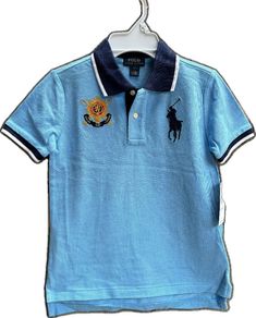 Fitted Light Blue Short Sleeve Polo Shirt, Blue Collared Polo Shirt Preppy Style, Light Blue Cotton Polo Collar Tops, Preppy Blue Collared Polo Shirt, Preppy Blue Cotton Polo Shirt, Preppy Short Sleeve Blue Shirt, Preppy Blue Polo Collar Top, Preppy Blue Short Sleeve Shirt, Blue Collared Preppy Tops