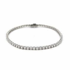 This stunning bracelet is made of 14K white gold, with a round diamond (RD) total carat weight (tcw) of 1.20. Its classic tennis bracelet design is sure to draw attention and make a lasting impression. 14K WG 4.15 RD TCW TENNIS 4P E-F VS1 MP-051 Bracelet Design, Stylish Jewelry, Tennis Bracelet, Bracelet Designs, Round Diamond, Round Diamonds, Jewelry Pieces, Natural Diamonds, To Draw