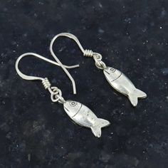 Fish Earrings, 925 Sterling Silver, Tiny Earrings, Fish Jewellery, Handmade Jewelry, Antique Earrings, Beach Jewellery, Christmas  Sale Product Details : Material : 925 Sterling Silver Earring Length : 40.5mm Approx Earring Width : 7mm Approx Earring Weight : 3.580 grams approx This jewellery is pure 925 Sterling silver and perfect for sensitive skin. Our product are totally hypoallergenic (perfect for sensitive skin) and made with high quality gemstones and 925 solid Sterling silver. Thank you Handmade Fish-shaped Earrings For Gifts, Silver Sterling Fish-shaped Earrings, Silver Dangle Earrings With Fish Hook, Silver Fish-shaped Sterling Silver Earrings, Silver Drop Earrings With Fish Hook, Handmade Silver Fish-shaped Earrings, Silver Fish-shaped Earrings With Ear Wire, Silver Fish-shaped Earrings With Fish Hooks, Nickel-free Silver Fish-shaped Earrings