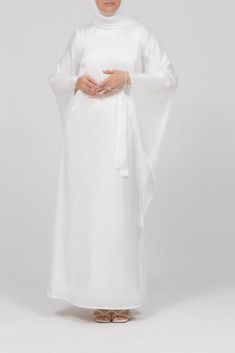 Front view of the ivory satin kimono sleeve Nikah maxi dress Floor-length Satin Finish Gown For Wedding, Satin Finish Floor-length Wedding Gown, White Satin Dress For Banquet, Elegant Satin Dress For Ceremony, White Satin Floor-length Dress, Floor-length Satin Dress For Wedding, Floor-length Satin Wedding Dress, White Floor-length Gown For Ceremony, White Satin Floor-length Gown