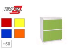 a white and green cabinet next to an orange and yellow sign with the word oracal on it