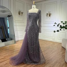 a dress on display in front of a mirror