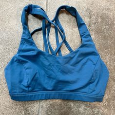 Cross Back Strap Feature Never Worn Excellent Condition Light Blue 4 Blue Sports Bra With Light Support For Yoga, Blue Sports Bra With Built-in Bra For Yoga, Casual Blue Sports Bra For Yoga, Yoga Sports Bra With Built-in Bra In Blue, Blue Go-dry Sports Bra For Yoga, Blue Moisture-wicking Sports Bra For Yoga, Blue Sports Bra With Built-in Bra For Light Exercise, Blue Go-dry Sports Bra For Workout, Blue Moisture-wicking Sports Bra For Pilates