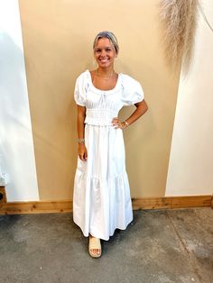 Introducing our Hannah Maxi Dress, the ultimate summer must-have! The short puffed sleeves and elastic waist provide a flattering fit, while the tiered design adds a touch of elegance. Made with 100% cotton, this dress is not just stylish, but also comfortable and breathable. Get ready to turn heads and feel confident in our Hannah Maxi Dress! Dress runs true to size. Model is wearing a size S. Summer Tiered Puff Sleeve Dress With Smocked Back, Chic Cotton Tiered Dress For Vacation, Casual Puff Sleeve Dress With Ruffles For Beach, Cotton Puff Sleeve Dress With Smocked Bodice For Brunch, Summer Tiered Ruched Puff Sleeve Dress, Cotton Tiered Mini Dress For Day Out, Cotton Puff Sleeve Ruched Dress For Day Out, Cotton Puff Sleeve Dress With Ruffles For Day Out, Cotton Tiered Dress For Brunch