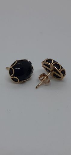 14K Solid Yellow Gold Natural and Smooth Oval Shape Onyx 10x7mm Stud Earrings. Product Info: -Dimensions:10mm x 7mm. -Metal: 14k -Finish: Yellow Gold -Stones : Oval Smooth Onyx. - Made in USA. -Nice Gift box is include. Black Oval Earrings For Anniversary, Black Oval Pierced Earrings, Black Oval Earrings For Formal Occasions, Classic Black Oval Earrings, Lover Jewelry, Gold Earring, Yellow Gold Earring, Gold Stud, Solid Yellow