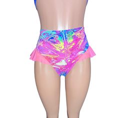 Introducing our Rave Bikini Bottom with Mesh Ruffle, the ultimate blend of sass and style for the dance floor diva in you! These hot pants are designed to make a statement with their high-thigh cut and super cheeky design, guaranteed to turn heads and set the dance floor on fire. The highlight of these hot pants is the mesh ruffle detailing on the sides, adding a touch of flirtatious flair and playful movement to your outfit. Whether you're grooving to the beat at a rave, hitting the club scene, High Waist Shorts For Cheerleading In Summer, High Waist Dancewear Bottoms For Summer, Summer Dancewear Bottoms For Night Out, Trendy High Waist Bottoms For Festivals, Flirty High-waisted Fitted Shorts, Flirty High Waist Shorts, High Waist Fitted Bottoms For Festival, Trendy Fitted Festival Bottoms, Hip-length Shorts For Summer Parties