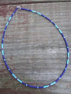 This beaded choker features light and dark blue seed beads. Light And Dark, Feature Light, Beaded Necklaces, Beaded Choker, May 21, Wire Jewelry, Jewelry Inspiration, Anklets, Light In The Dark