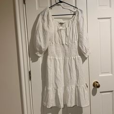 This Boston Proper White Peasant Style Dress Is A Canvas For Your Fashion Imagination! Go For A Natural For A Clean Crisp Look Or Add A Pop Of Color Jewelry For A Stand Out Statement! Size Medium New/Never Worn Location E-73 Summer Peasant Dress With Puff Sleeves, Spring Peasant Dress With Puff Sleeves, Casual Summer Peasant Dress With Puff Sleeves, Casual Peasant Dress For Spring Vacation, Spring Casual Peasant Dress With Ruffle Hem, Casual Spring Peasant Dress With Ruffle Hem, Spring Peasant Dress With Short Sleeves, Casual Peasant Dress With Short Sleeves For Vacation, Flowy Casual Peasant Dress With Short Sleeves