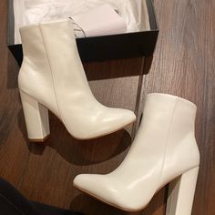 All White Brand New Never Worn Size 7 White Comes With Box Pleather White Heels Boots, Chic White Closed Toe Heeled Boots, Trendy White Faux Leather Heeled Boots, White Booties With Stacked Block Heel, White Booties With Stacked Heel, Trendy Cream Booties With Round Toe, White Faux Leather Heels With Stacked Heel, White Round Toe Booties For Party, White Round Toe Party Booties