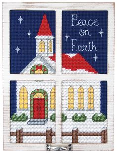 three cross stitch christmas cards with the words peace on earth and a church in the background