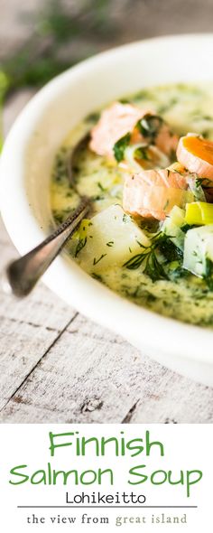 a white bowl filled with salmon and vegetables