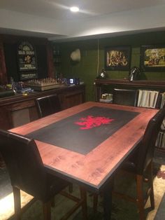 a wooden table sitting in the middle of a room